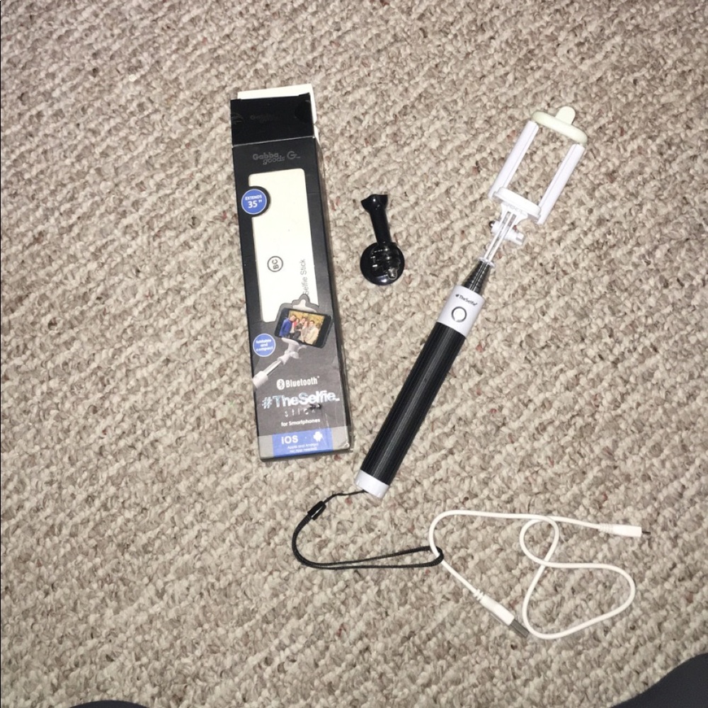 Bluetooth selfie stick.Brand new w charger and box